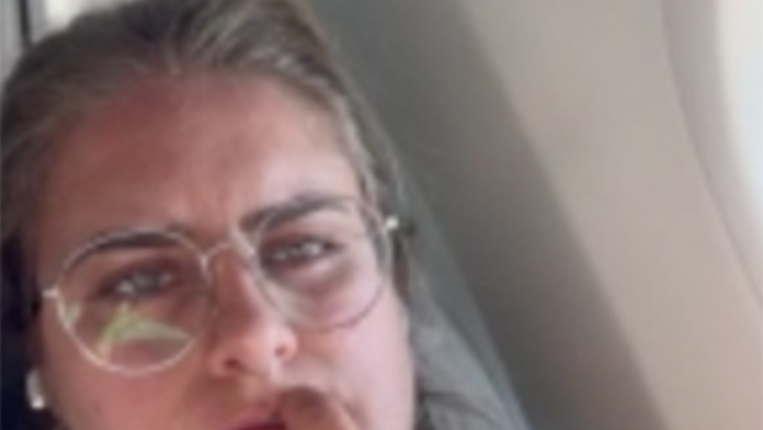 Airline passenger goes viral for recording neighbor's midflight photo attempts