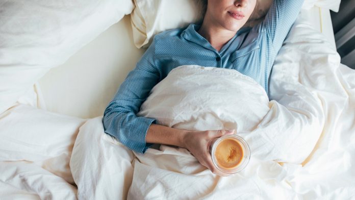 'Hurkle-durkling' is the viral travel trend that involves lying in bed all day