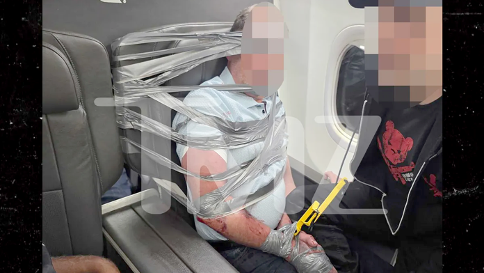 American Airlines passenger duct-taped to seat after alleged racist, homophobic midair outburst
